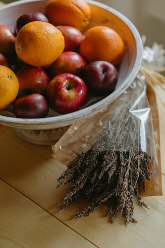 Image of a bowl of fruit and lavender to show how Shape ReClaimed Program